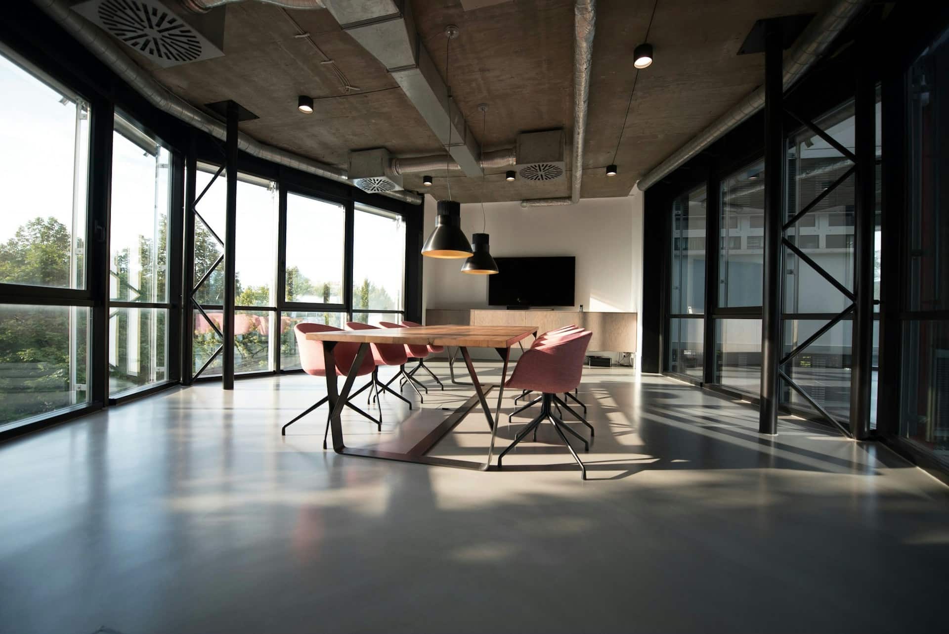 A bright contemporary meeting room with a large conference table